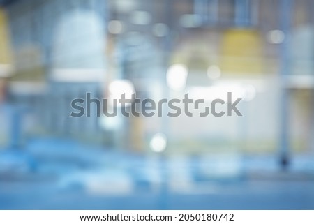 BLURRED OFFICE BACKGROUND, MODRN BUSINESS ROOM WITH WINDOW LIGHT REFLECTIONS
