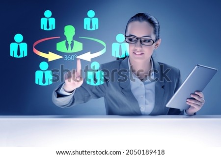360 degree concept with businesswoman pressing button Royalty-Free Stock Photo #2050189418