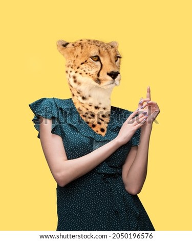 Elegance, grace. Contemporary artwork, conceptual art collage. Woman headed by cheetah's head isolated on blue background. Fashion, emotions, ad, sales, surrealism concept.