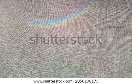 rainbow reflection of bright colors on fabric