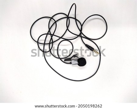 microphone lavalier on white background closeup photo