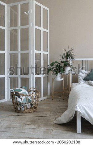 Bright cozy bedroom in pastel colors