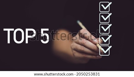 Hand writing Top 5. 5 checkmarks on black background Royalty-Free Stock Photo #2050253831