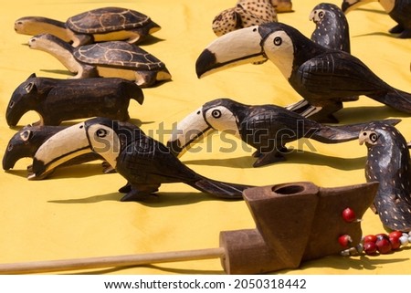 Wood carving of Guarani Indians, Brazil Royalty-Free Stock Photo #2050318442