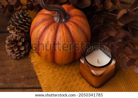 Autumn Still Life with Candle and Pumpkin