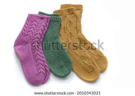 Woolen socks. Suitable for a wide variety of situations, you can post their photo in the office, school, camping, outdoors, in sports, indoors, at home, at work, in winter, or in any cold and snowy 