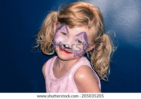 beautiful blond girl with face painting