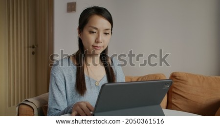 Woman work on tablet computer