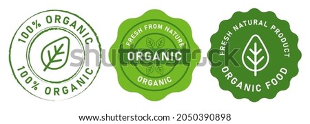 organic food stamp label design 100% organic natural in green color seal tag sticker design graphic isolated Royalty-Free Stock Photo #2050390898