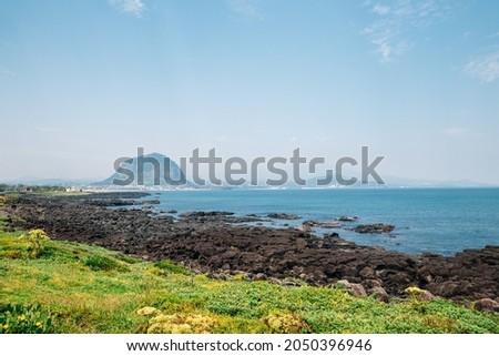Sanbangsan Mountain and beach, Jeju Olle Trail in Jeju island, Korea Royalty-Free Stock Photo #2050396946