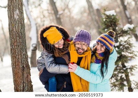 Photo of cheerful family happy positive smile enjoy time together mommy daddy daughter piggyback walk park