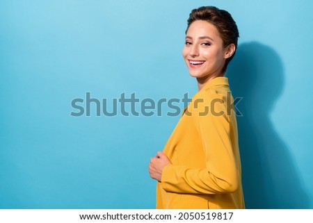 Profile side view portrait of attractive cheerful businesswoman expert posing copy space isolated over bright blue color background