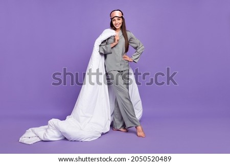 Full size photo of happy young woman wear nightwear hold blanket enjoy isolated on purple color background Royalty-Free Stock Photo #2050520489