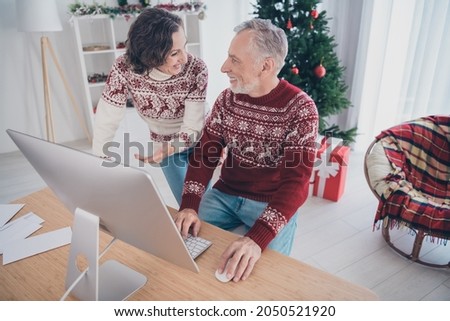 Photo of funny couple aged lady man talk write pc wear sweater jeans at home
