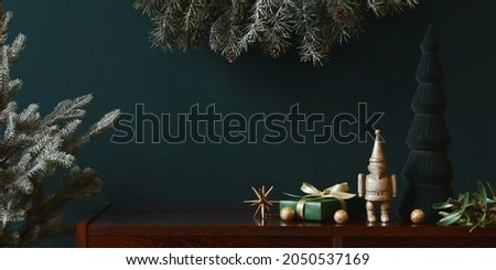 Christmas composition with decoration, christmas tree, gifts and accessories in cozy home decor. Copy space. Template.