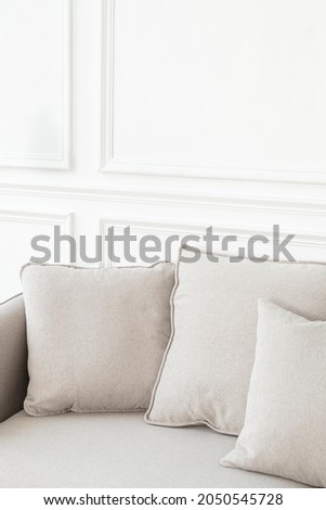 Minimal cushion cover in white in the living room Royalty-Free Stock Photo #2050545728