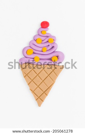 Ice cream  from children bright plasticine - Stock Image macro.
