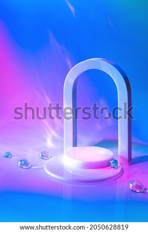 Abstract surreal scene - empty stage with cylinder podium and arch on holographic neon background with glass beads in water. Pedestal for cosmetic, beauty product, packaging mockups presentation