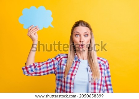 Photo of impressed blond young lady show feedback wear blue shirt isolated on yellow color background