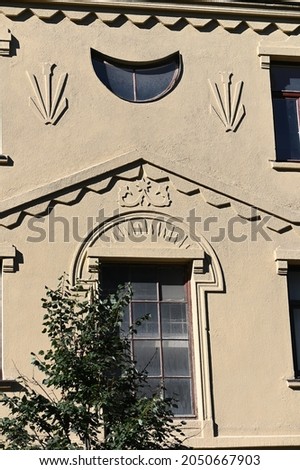 a fragment of a historic building with a single window
