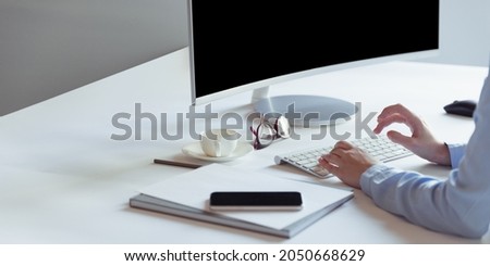 Office workplace with computer and laptop. Creating new project ideas. FInancial growth. Concept of business, career, achievement, money, work. Copy space for ad Royalty-Free Stock Photo #2050668629