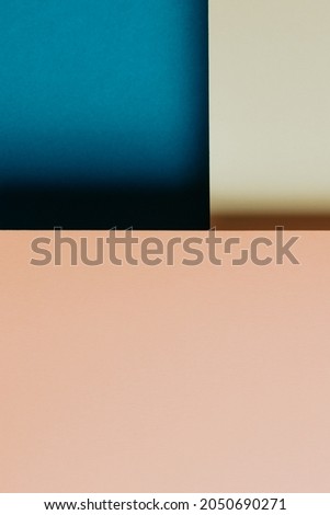 Abstract blue, yellow and orange and yellow color paper geometry composition background, minimalist shadows, copy space. Minimal geometric shapes. Colorful background concept