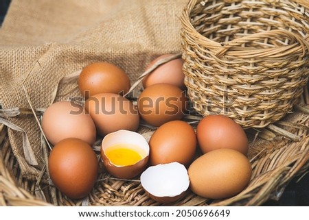 Leadership concept with fresh chicken eggs and duck egg in carton.
