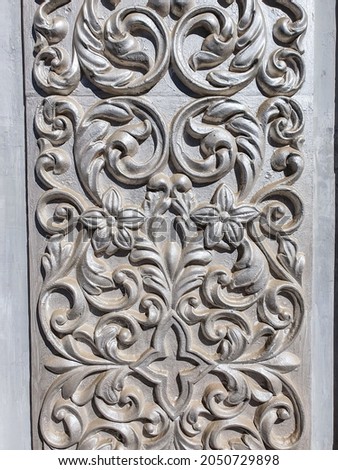 classic floral pattern is carved on marble slab, Uzbek ornament, abstract background