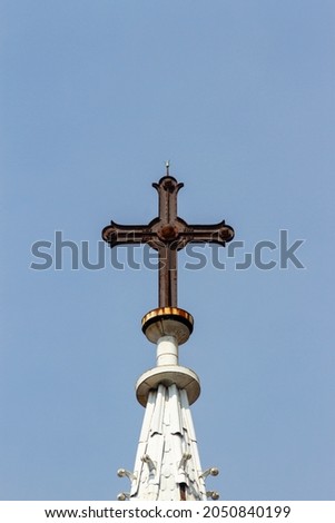 Catholic Cross On The Top Of Notre-Dame Cathedral Basilica Of Saigon In Ho Chi Minh City, Vietnam.