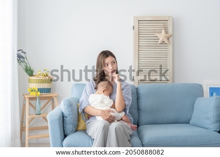 Asian family in the room Royalty-Free Stock Photo #2050888082