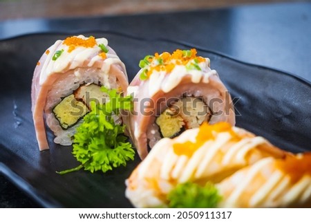 shushi and shushi roll is a Japanese food that is very popular in Thailand. Sold in local markets