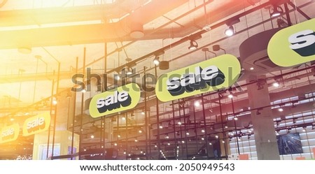 Yellow stands with inscription sale in white letters.Big discount price in shopping center.Advertising of Black Friday cheap cosmetics for make up.Banner with season sale concept.Copy space for text
