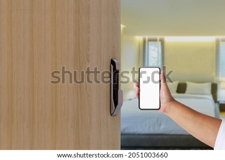 Hotel door security Unlocking by application on mobile phone. Digital door lock, keyless system of access door. Digital Door handle or Electronics knob for access to room security,