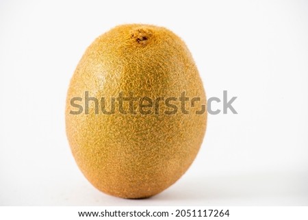 Kiwi fruit macro close up, white background, horizontal format