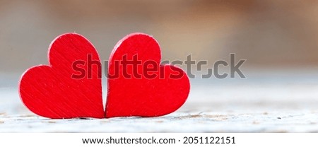 Hearts of fabric on a wooden background. Time for lovers' day, Valentine's day.