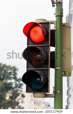 a traffic light with red light. symbolic photo for maintenance, economic, failure