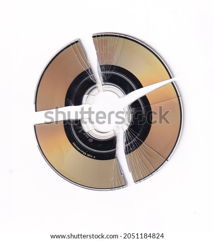 
Broken yellow gold CD CompactDisk
