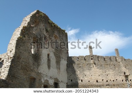 View on ruins of a medieval castle. Selective focus. High quality photo Royalty-Free Stock Photo #2051224343