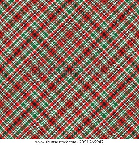 Red and green Christmas plaid. Seamless vector diagonal tartan. Suitable for fashion, home decor and stationary.