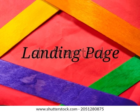 Text Landing page written on notepaper with colored ice cream sticks.