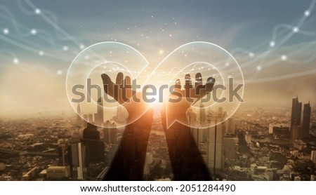 Businessman hold circular economy icon. Sustainable strategy approach to eliminate waste and pollution for future growth of business and environment, design to reuse and renewable material resources
 Royalty-Free Stock Photo #2051284490