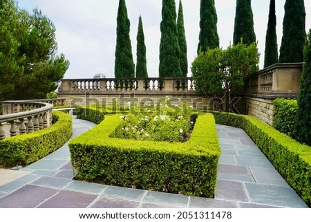vivd green square garden and tress  Royalty-Free Stock Photo #2051311478