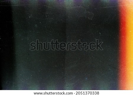 Dusty scratched grunge scanned old film texture Royalty-Free Stock Photo #2051370338