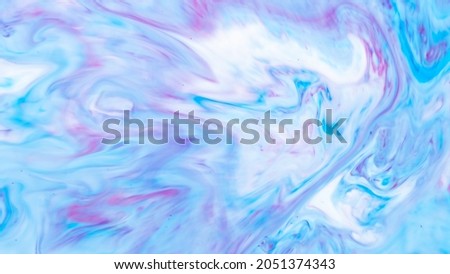 Fluid Art. Abstract liquid paint textured background with decorative spirals and swirls. Liquid pink blue backdrop