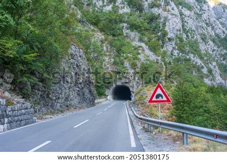Asphalt road and a tunnel along the Tara Canyon, northern Montenegro
