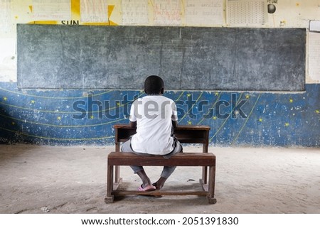 Authentic poor shool with good boys inside Royalty-Free Stock Photo #2051391830