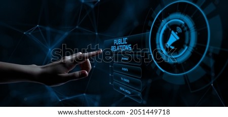 PR Public relations advertising advertisement. Hand pressing button on screen. Royalty-Free Stock Photo #2051449718