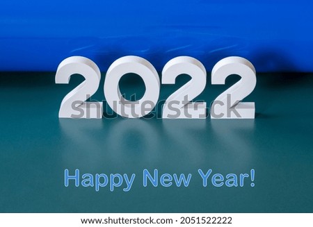 New Year's greetings with numbers 2022 and the text "Happy New Year".