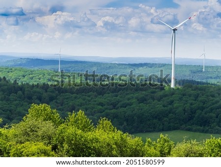 Beautiful forest landscape with windmills in saarland germany europe Royalty-Free Stock Photo #2051580599