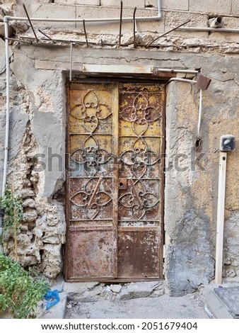 a very old rusty door